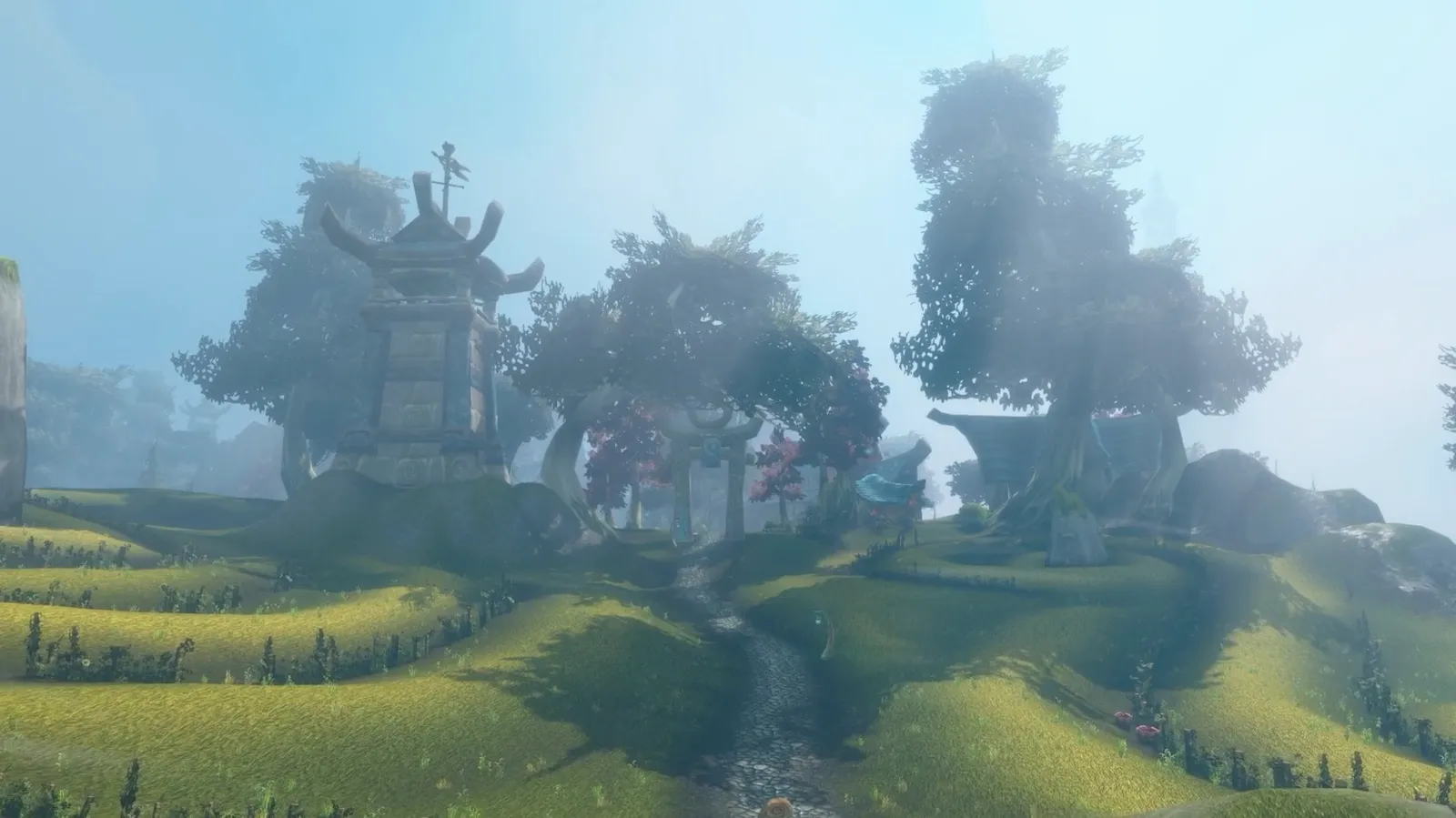 Zephras Isle, with grassy hills, a cobbled path and Skyborne towers in the mist