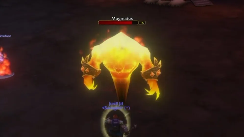 The fire elemental Magmatus, level 16, towers over a Dwarf tank in The Hall of Thanes, a screenshot from the beta of World of Warcraft: Forever