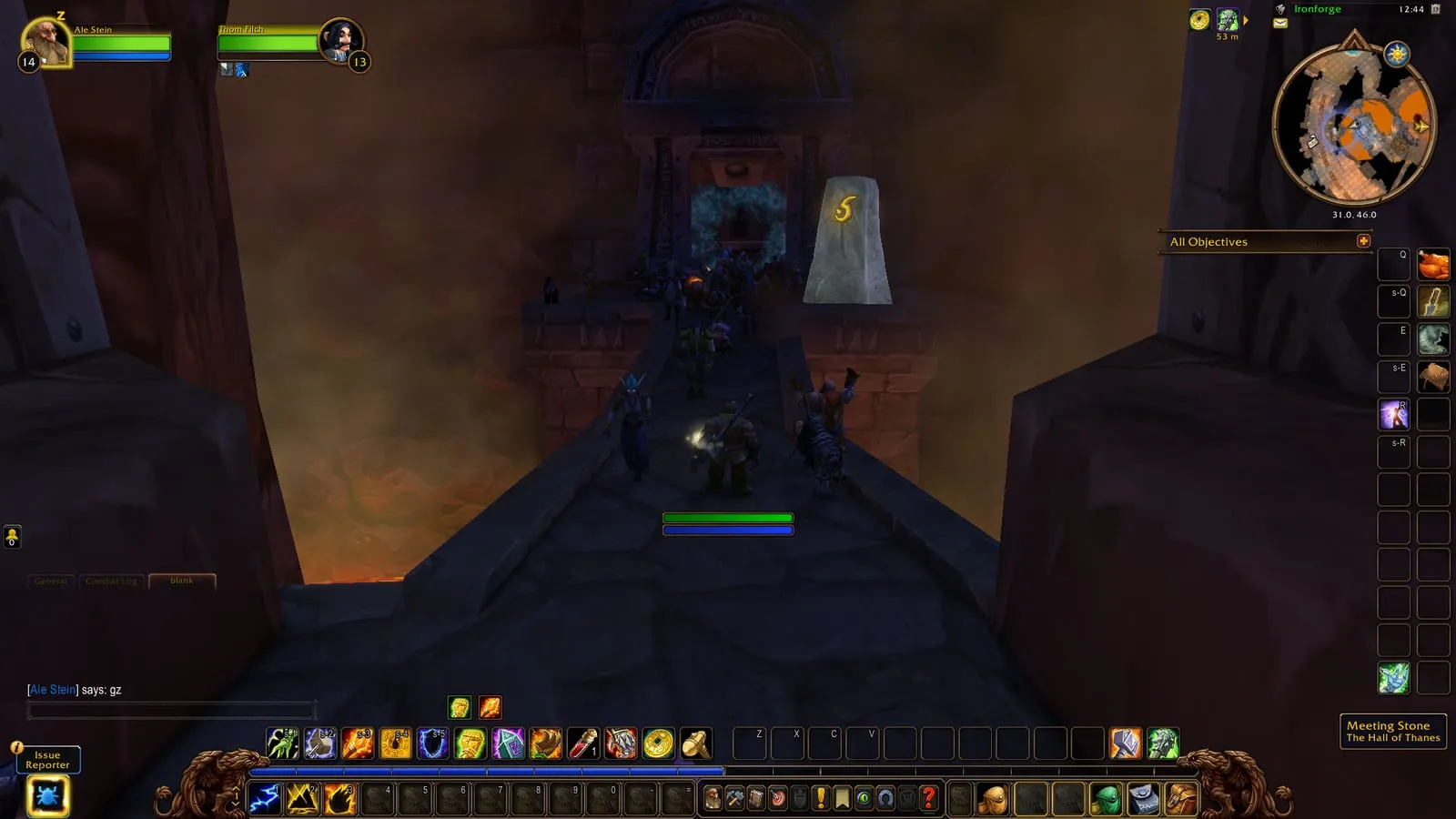 A narrow stone bridge above lava leading to the portal of the Hall of Thanes, a screenshot from the beta of World of Warcraft: Forever