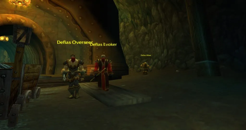 A Defias Overseer and a Defias Evoker on patrol in the Deadmines, a screenshot from World of Warcraft