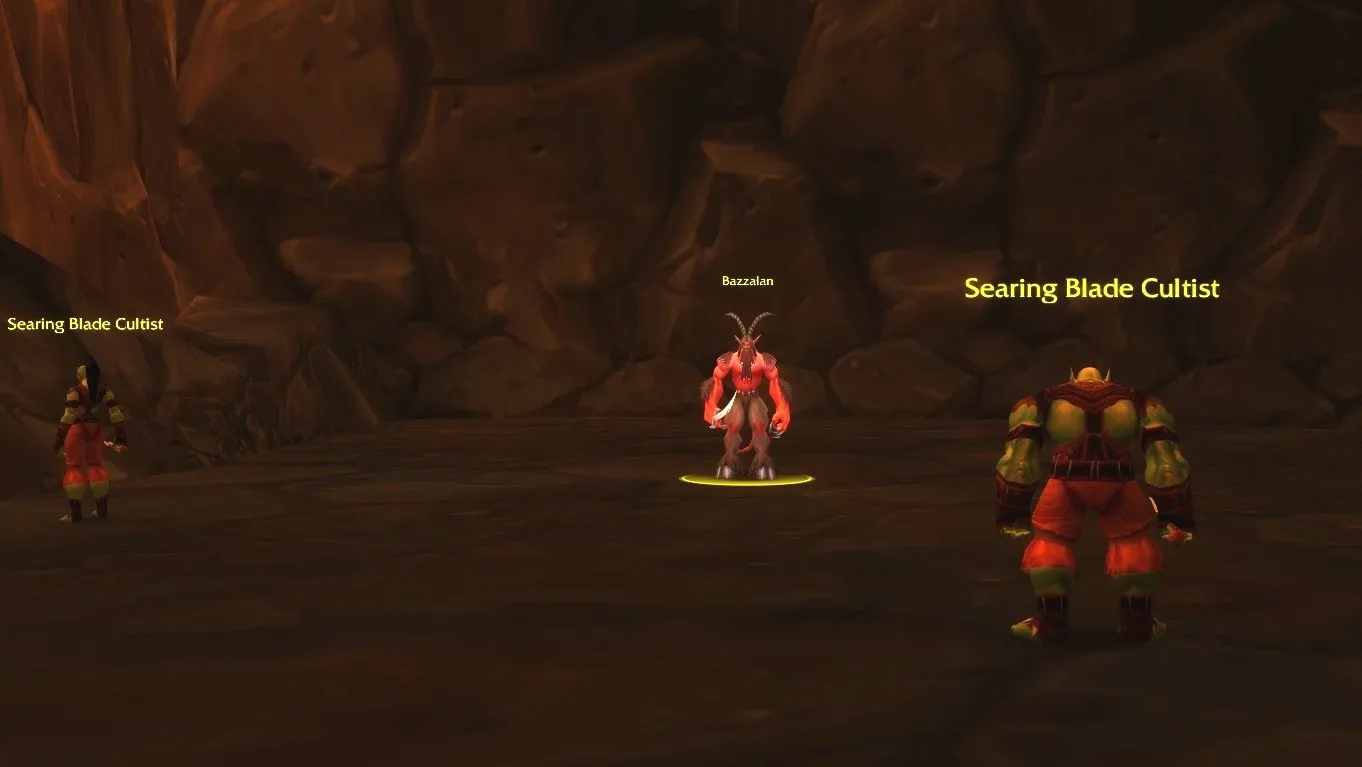 Bazzalan between two Searing Blade Cultists on a ledge in Ragefire Chasm, a screenshot from World of Warcraft