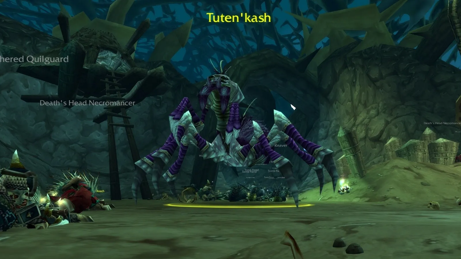 Tuten’kash, a giant spider, among webs in Razorfen Downs, a screenshot from World of Warcraft