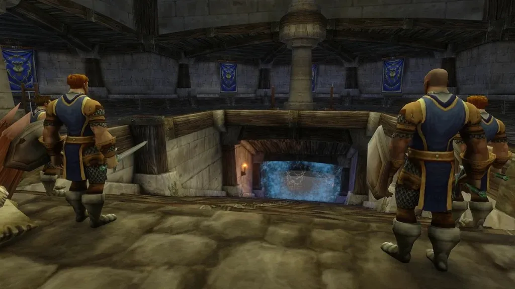 Guards of Stormwind above the stairs that lead down to the portal of the Stockade, a screenshot from the beta of World of Warcraft: Forever