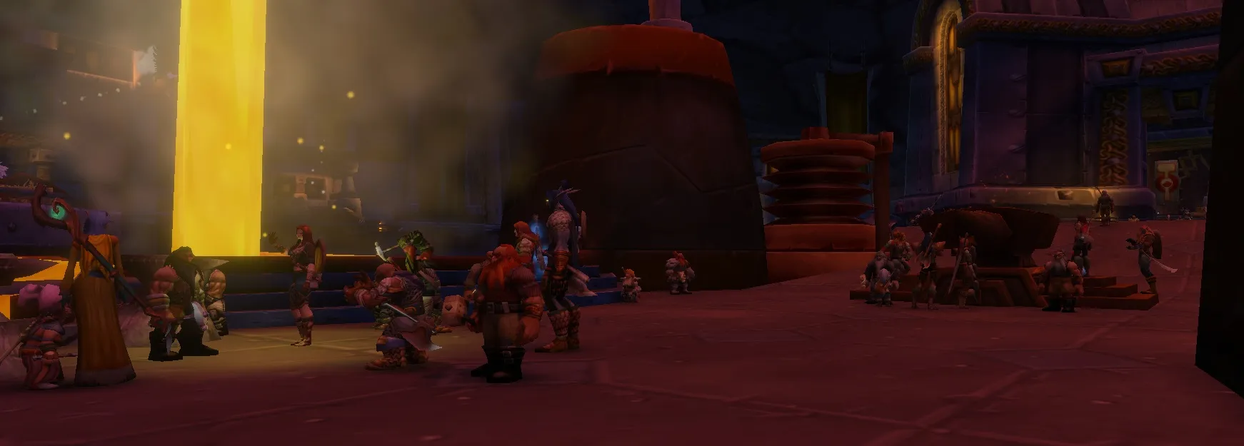 Players gather by a stream of molten metal in a dark dwarven forge hall, a screenshot from the beta of World of Warcraft: Forever