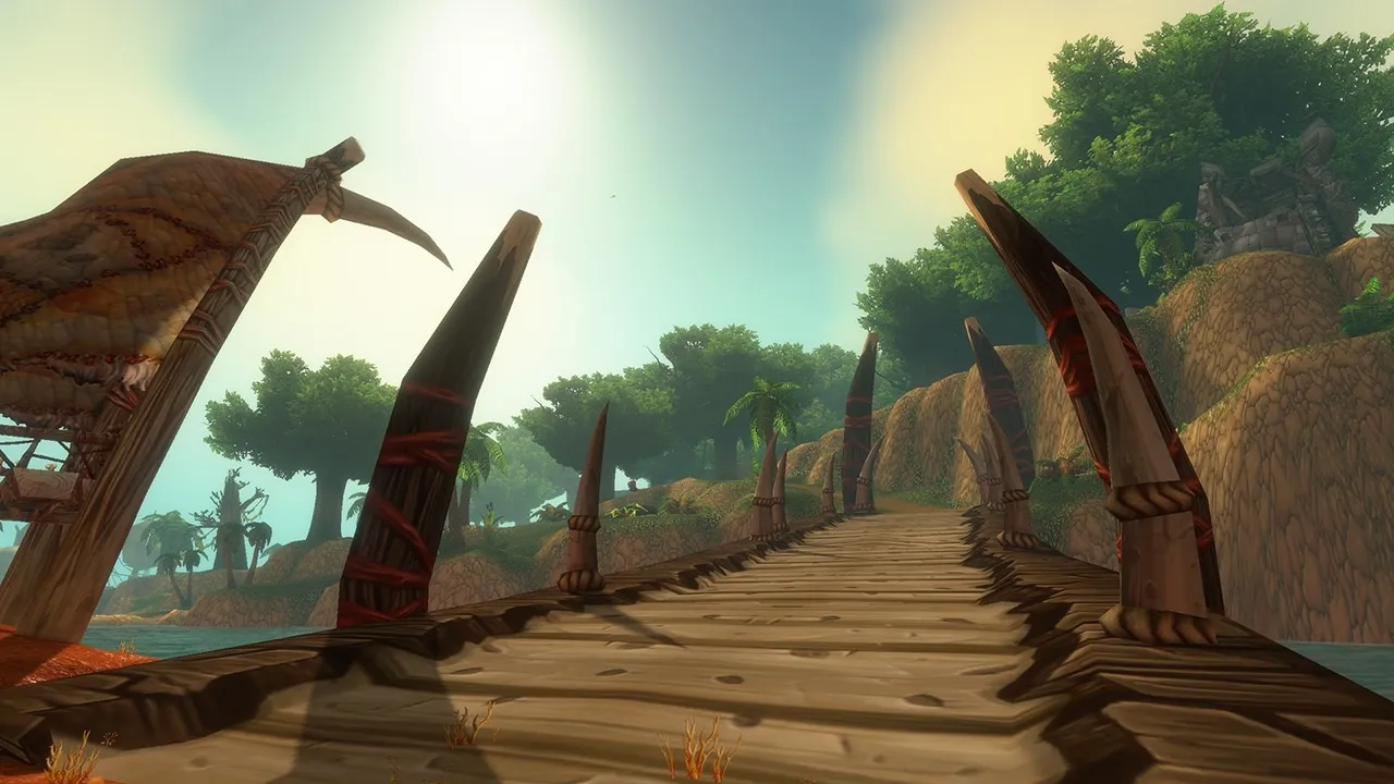 A wooden bridge between tusks wrapped in red cloth, leading into the jungle of the Darkspear Islands, an official screenshot of World of Warcraft: Forever