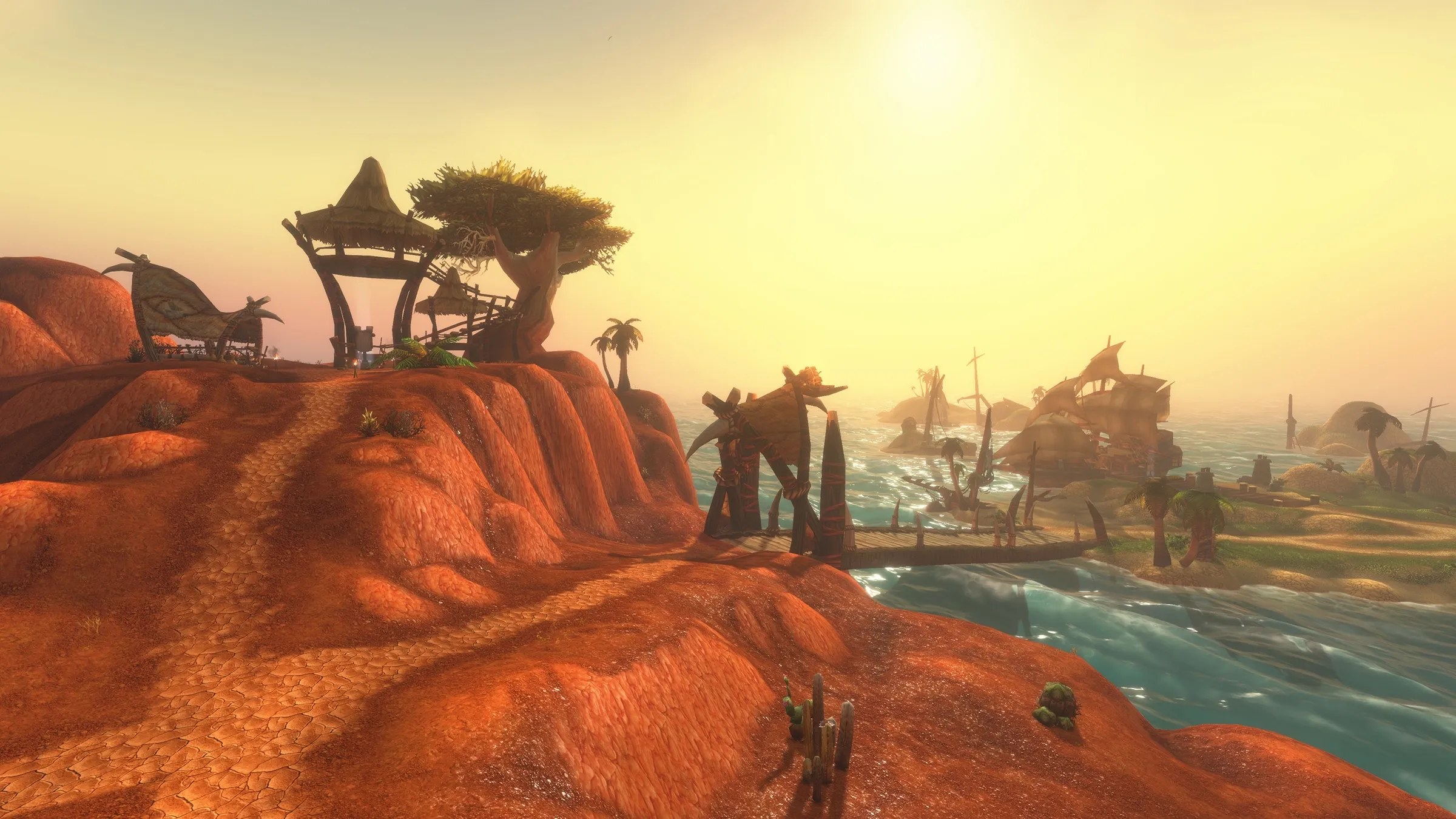 A path over red rocks to a troll hut on a cliff, with a wrecked ship and the sea behind, on the Darkspear Islands, an official screenshot of World of Warcraft: Forever