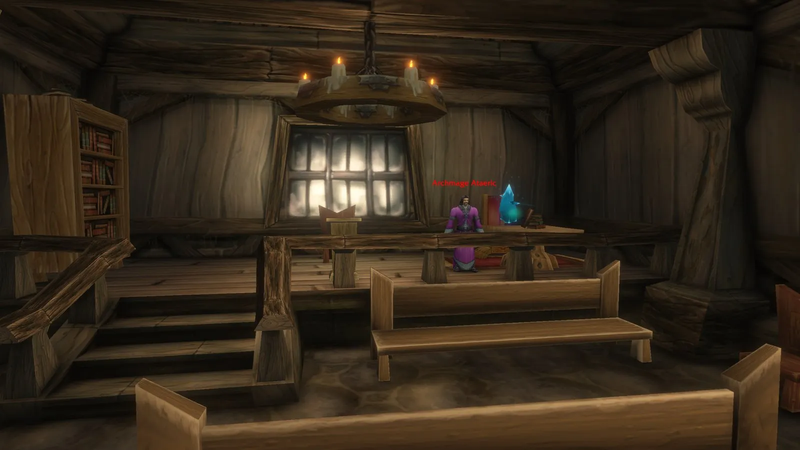 Il municipio di Ambermill con Archmage Ataeric dietro una scrivania e un cristallo blu accanto, uno screenshot dalla beta di World of Warcraft: Forever