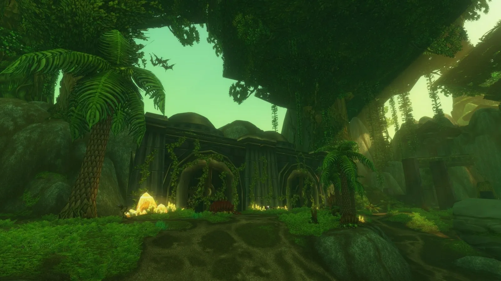 Overgrown stone ruins under a canopy of jungle trees with a glowing yellow light at the entrance, a screenshot from World of Warcraft
