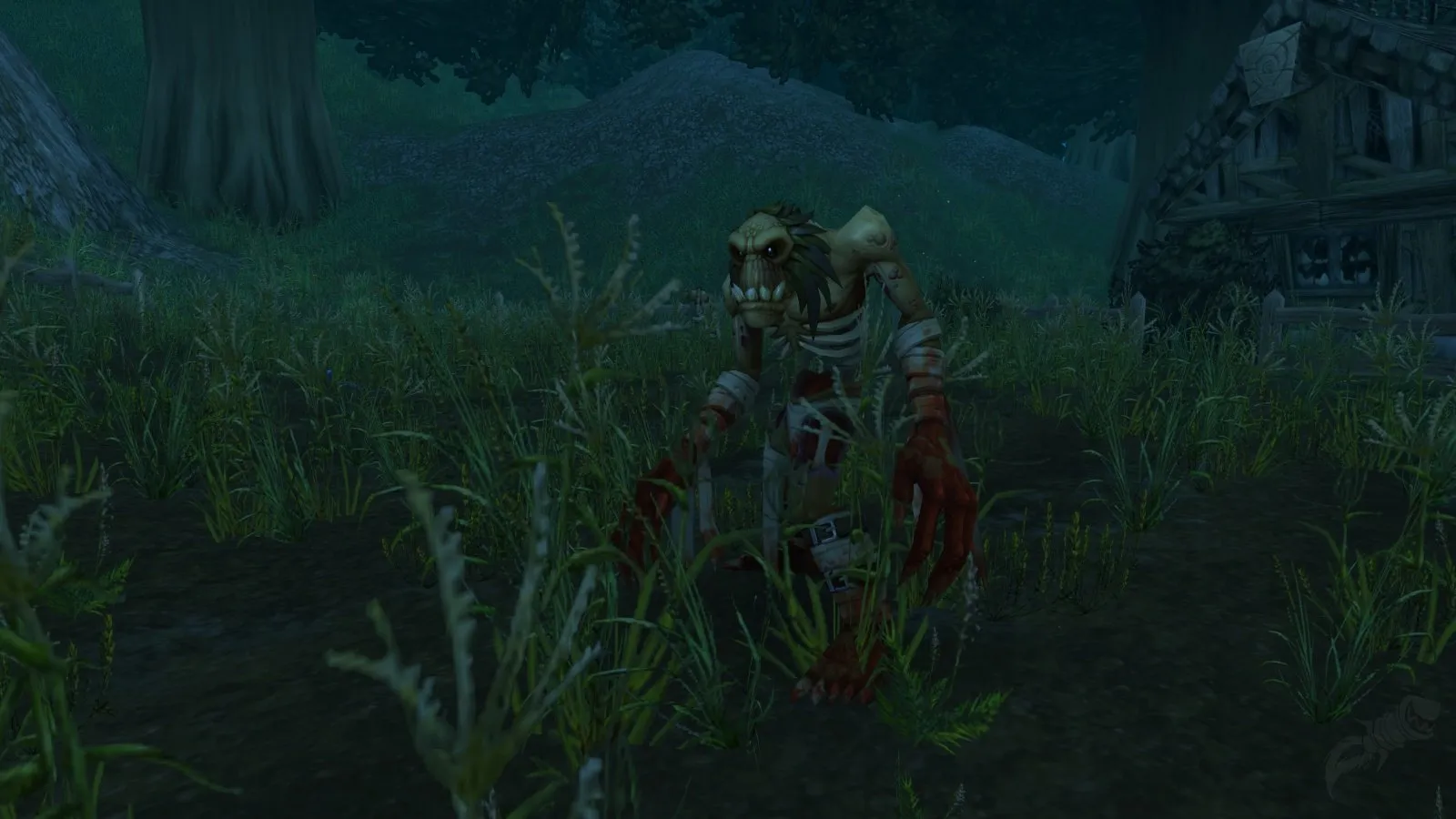 Un Disturbed Ghoul emerge di notte dall'erba di un cimitero di Duskwood, uno screenshot dalla beta di World of Warcraft: Forever