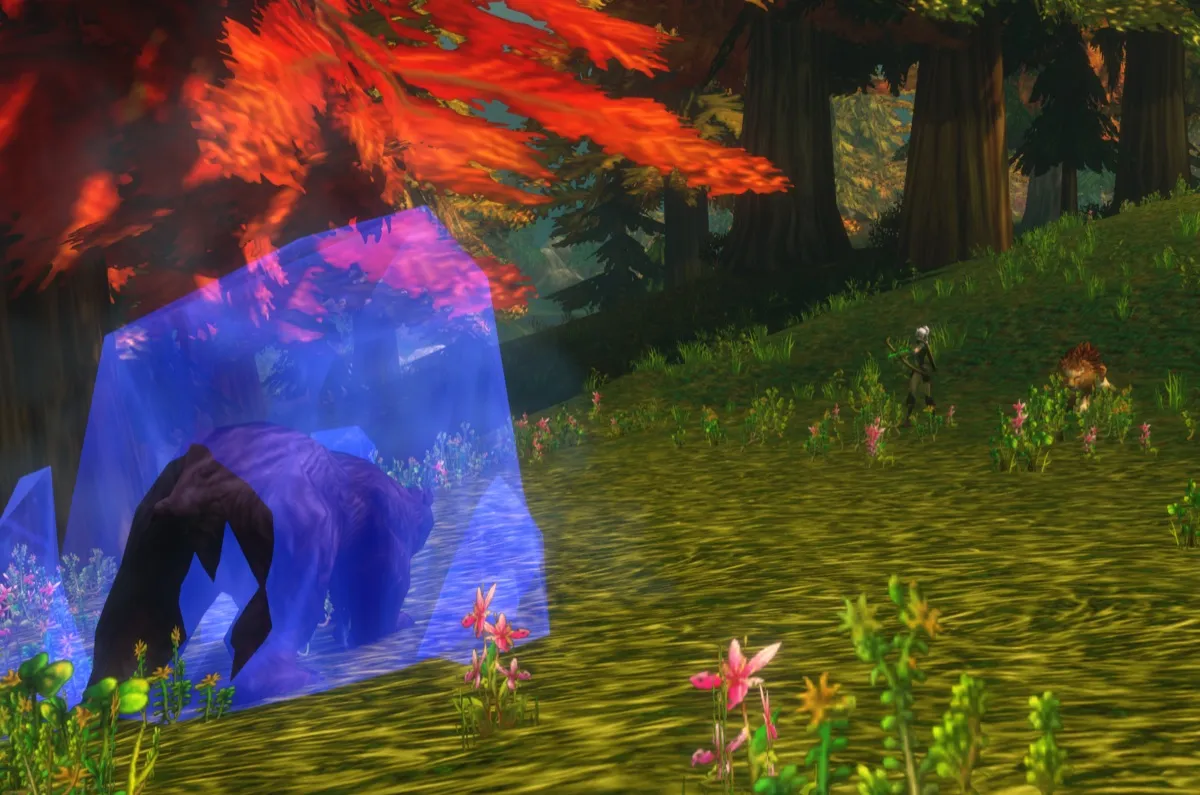 A bear frozen in a block of ice by Freezing Trap, with a Hunter and a pet in the background