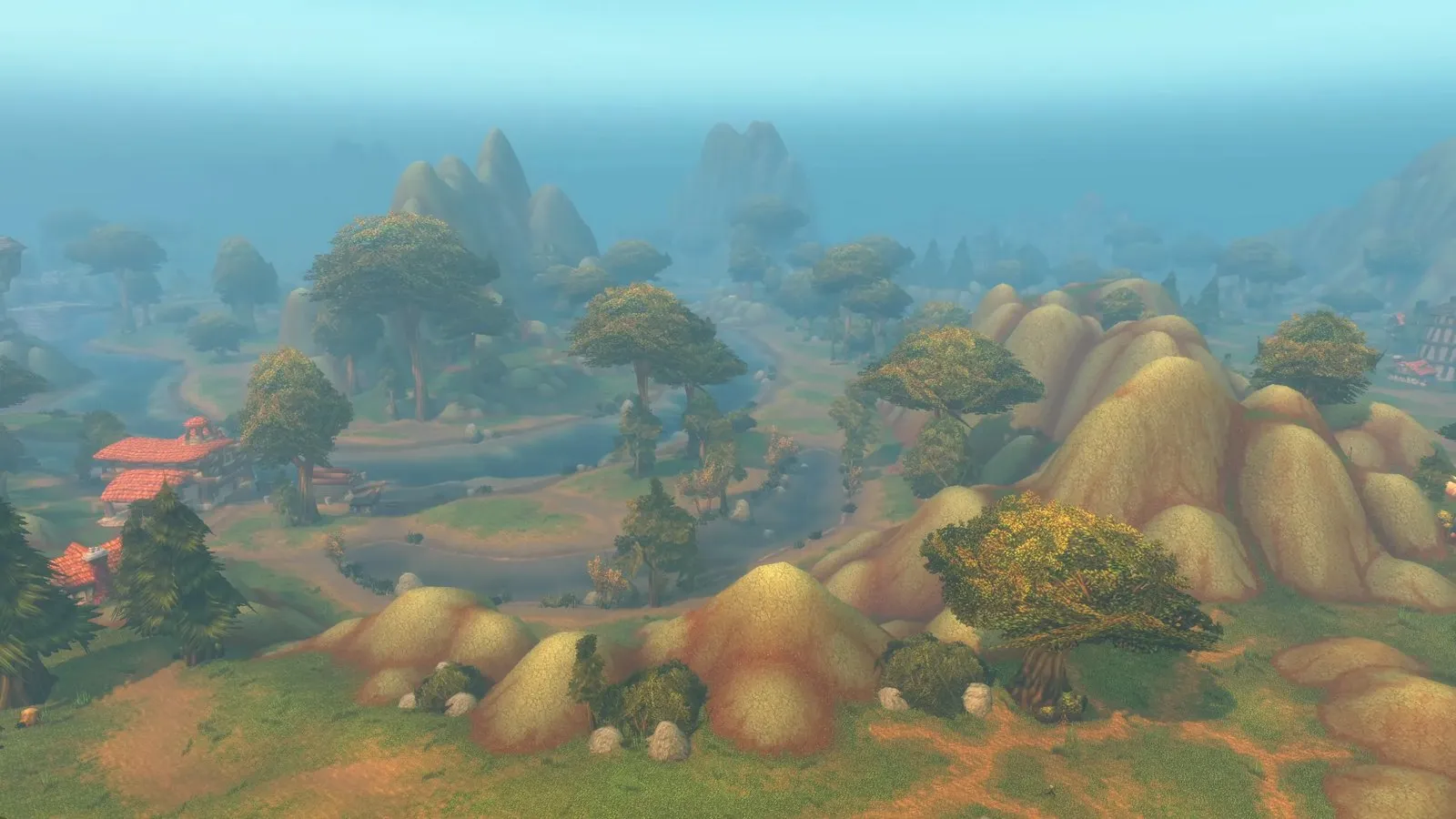 Groene heuvels, hoge bomen en een kronkelende rivier in The Riverglades, een schermafdruk van World of Warcraft: Forever