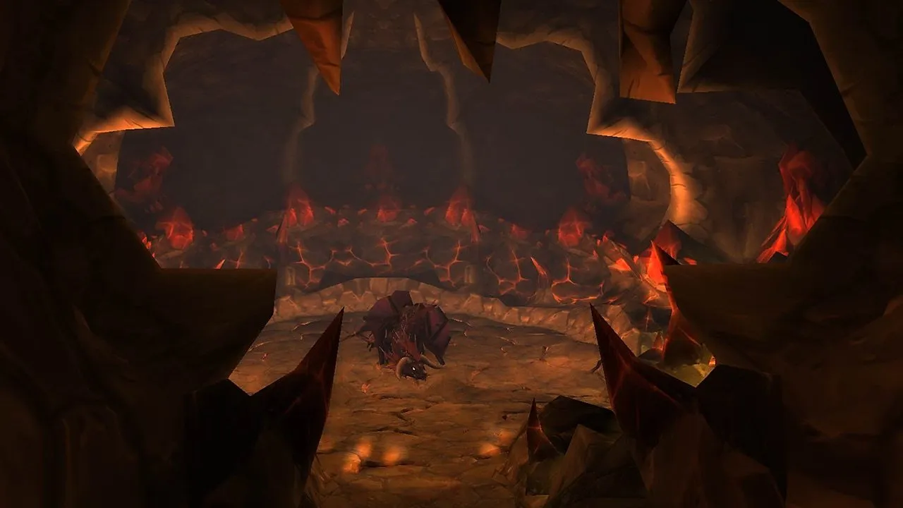 Onyxia nella sua tana, una grotta con lava rossa incandescente e denti di roccia