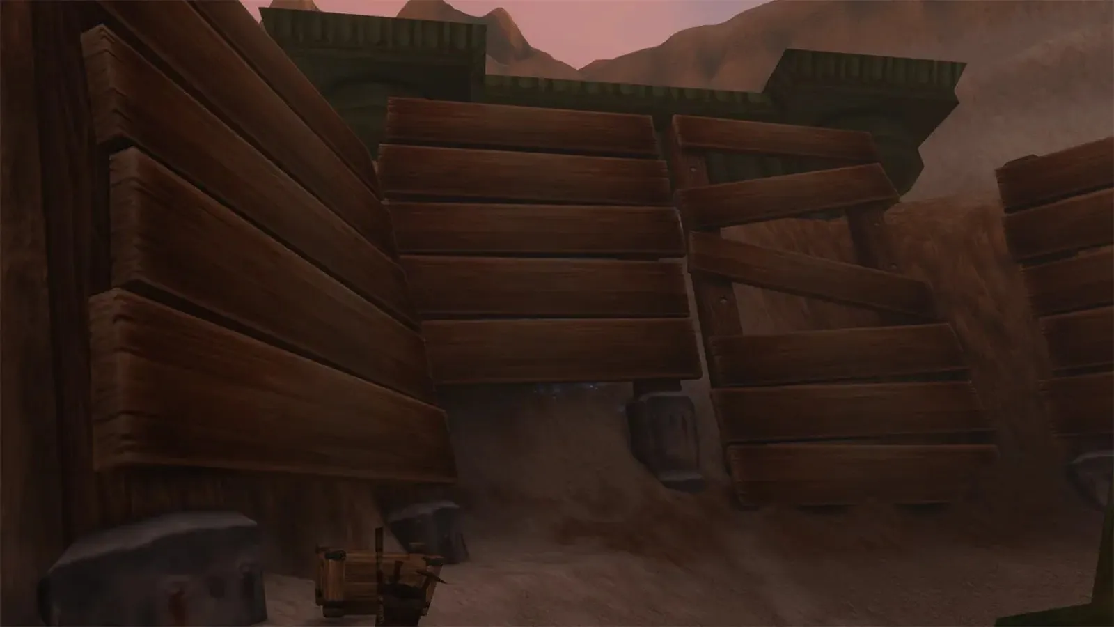 Una pared de tablones de madera que cierra un túnel en el Rustmaul Dig Site, una captura de pantalla de la beta de World of Warcraft: Forever