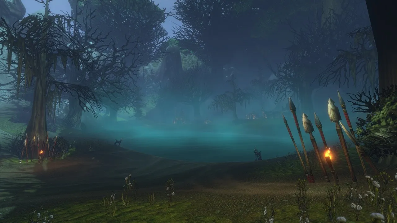 A misty swamp at night with a lake, dead trees and burning spears in the foreground, an image from Blizzard of World of Warcraft: Forever